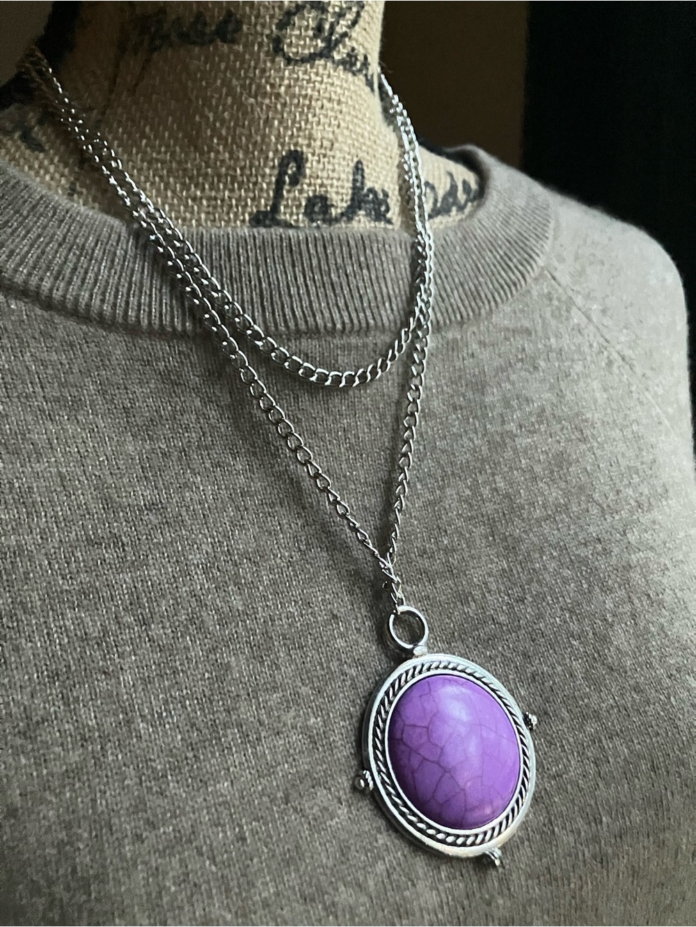 Round purple stone pendant with silver chain